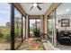 Sunroom providing extra living space, views and outdoor access to home at 6816 Sw 95Th Cir, Ocala, FL 34481