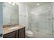 Bathroom with vanity and a glass-enclosed tub/shower at 7249 Sw 93Rd Ave, Ocala, FL 34481