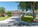 Charming single-story home with a well-maintained lawn and a two-car garage at 7249 Sw 93Rd Ave, Ocala, FL 34481