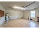 Spacious garage with epoxy flooring, sink, and ceiling fan at 7249 Sw 93Rd Ave, Ocala, FL 34481