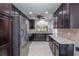 Modern kitchen with stainless steel appliances and ample cabinet space at 7249 Sw 93Rd Ave, Ocala, FL 34481