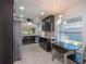 Open-concept kitchen with a dining area and stainless steel appliances at 7249 Sw 93Rd Ave, Ocala, FL 34481