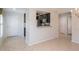 Bright living area with an opening to the kitchen and a view of the front door at 7249 Sw 93Rd Ave, Ocala, FL 34481