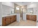 Spacious bathroom with double vanity, tiled shower, and neutral color scheme at 7827 Sw 56Th Pl, Ocala, FL 34474