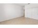 Bedroom featuring tile flooring, closet and view into other rooms at 7827 Sw 56Th Pl, Ocala, FL 34474