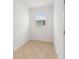 Small closet featuring natural light and tile flooring at 7827 Sw 56Th Pl, Ocala, FL 34474