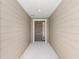 Inviting entryway featuring a modern door with sidelight at 7827 Sw 56Th Pl, Ocala, FL 34474
