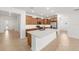 Modern kitchen featuring an island, stainless steel appliances, and ample cabinet space at 7827 Sw 56Th Pl, Ocala, FL 34474