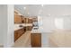 Modern kitchen featuring ample cabinet space, stainless steel appliances, and a large center island at 7827 Sw 56Th Pl, Ocala, FL 34474