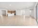 Open-concept living space showcasing tiled floors and a kitchen at 7827 Sw 56Th Pl, Ocala, FL 34474