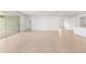 Open living area with tiled floors and sliding glass doors, leading to backyard at 7827 Sw 56Th Pl, Ocala, FL 34474