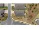 Aerial perspective of a neighborhood with manicured lawns, landscaping, sidewalks and orderly placement of homes at 9063 Sw 59Th Lane Rd, Ocala, FL 34481
