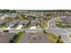 Aerial view of a residential neighborhood showcases neat rows of houses with well-maintained lawns and tree-lined streets at 9063 Sw 59Th Lane Rd, Ocala, FL 34481
