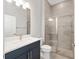 Bathroom featuring a glass enclosed shower, single sink and tile flooring at 9063 Sw 59Th Lane Rd, Ocala, FL 34481