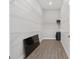 Walk-in closet with wood floor and metal shelving for storage at 9063 Sw 59Th Lane Rd, Ocala, FL 34481