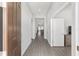 Inviting entryway with wood-look flooring and a view into the living spaces at 9063 Sw 59Th Lane Rd, Ocala, FL 34481