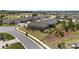 View of rear exteriors and lush landscaping in an upscale neighborhood at 9063 Sw 59Th Lane Rd, Ocala, FL 34481