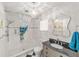 Updated bathroom features a tiled shower, elegant vanity, and modern fixtures and finishes at 9333 Sw 97Th Pl # C, Ocala, FL 34481