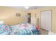 Comfortable bedroom with wood floors, ample closet space and a coastal theme that makes it ideal for relaxing at 9333 Sw 97Th Pl # C, Ocala, FL 34481