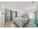 Bright bedroom features coastal-themed decor and ample natural light at 9333 Sw 97Th Pl # C, Ocala, FL 34481
