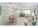Inviting living and dining area with modern decor and an abundance of natural light at 9333 Sw 97Th Pl # C, Ocala, FL 34481