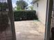 Backyard of the home with a small patio area at 9896 Sw 61St Ct, Ocala, FL 34476