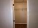 Bedroom closet with wire shelving and white walls at 9896 Sw 61St Ct, Ocala, FL 34476