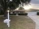 Charming single-story home with a two car garage and a well-manicured front yard and garden at 9896 Sw 61St Ct, Ocala, FL 34476