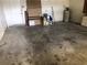 View of the garage with concrete flooring at 9896 Sw 61St Ct, Ocala, FL 34476