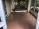 Covered patio featuring tile flooring and views of the backyard at 9896 Sw 61St Ct, Ocala, FL 34476