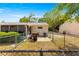 Backyard with patio and partial fencing, with view of the rear of the property at 10824 Sw 90Th Ter, Ocala, FL 34481