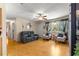 Cozy living room with wood flooring, modern furniture and lots of natural light at 10824 Sw 90Th Ter, Ocala, FL 34481