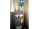 Classic series Rheem water heater with expansion tank and energy guide at 10980 Sw 63Rd Ave, Ocala, FL 34476