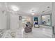 Bright living room featuring marble floors, contemporary seating, and ample natural light at 1109 Ne 22Nd Ave, Ocala, FL 34470