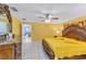 The main bedroom features detailed wood furniture, tiled floors and a private ensuite bathroom at 1109 Ne 22Nd Ave, Ocala, FL 34470