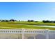 Scenic backyard view overlooking the pond and golf course at 11799 Se 173Rd Lane Rd, Summerfield, FL 34491