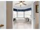 Bright bathroom features a garden tub with built-in shelving, windows and a vanity at 11799 Se 173Rd Lane Rd, Summerfield, FL 34491