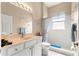 Clean bathroom with neutral finishes, a shower, and good lighting at 11799 Se 173Rd Lane Rd, Summerfield, FL 34491