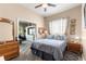 Relaxing bedroom with natural light and a view to the living area at 11799 Se 173Rd Lane Rd, Summerfield, FL 34491