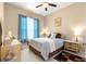 Bright bedroom with carpet, natural light, and soft blue accents at 11799 Se 173Rd Lane Rd, Summerfield, FL 34491