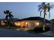 Charming single-story home with a well-maintained lawn and a two-car garage at 11799 Se 173Rd Lane Rd, Summerfield, FL 34491
