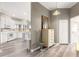 Hallway with access to the kitchen, bathroom and other rooms at 11799 Se 173Rd Lane Rd, Summerfield, FL 34491