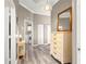Hallway with access to rooms and ample storage at 11799 Se 173Rd Lane Rd, Summerfield, FL 34491