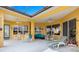 Spacious lanai perfect for outdoor lounging with a ceiling fan at 11799 Se 173Rd Lane Rd, Summerfield, FL 34491