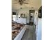Bedroom with large bed, a white dresser, and a television at 14 Se 62Nd Ter, Ocala, FL 34471