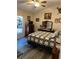 Cozy bedroom featuring a quilt, dresser, decorations, and window with blinds at 14 Se 62Nd Ter, Ocala, FL 34471