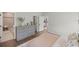 Spacious bedroom with an en-suite bathroom, hardwood floors, and ample closet space at 15769 Sw 37Th Cir, Ocala, FL 34473