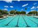 Large community pool with designated swimming lanes and clear blue water at 15782 Sw 16Th Avenue Rd, Ocala, FL 34473