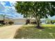 Well-maintained single Gathering home featuring a lush green lawn and mature landscaping at 15782 Sw 16Th Avenue Rd, Ocala, FL 34473