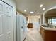 Bright eat-in kitchen featuring white appliances, tile flooring and access to the rest of the home at 15782 Sw 16Th Avenue Rd, Ocala, FL 34473